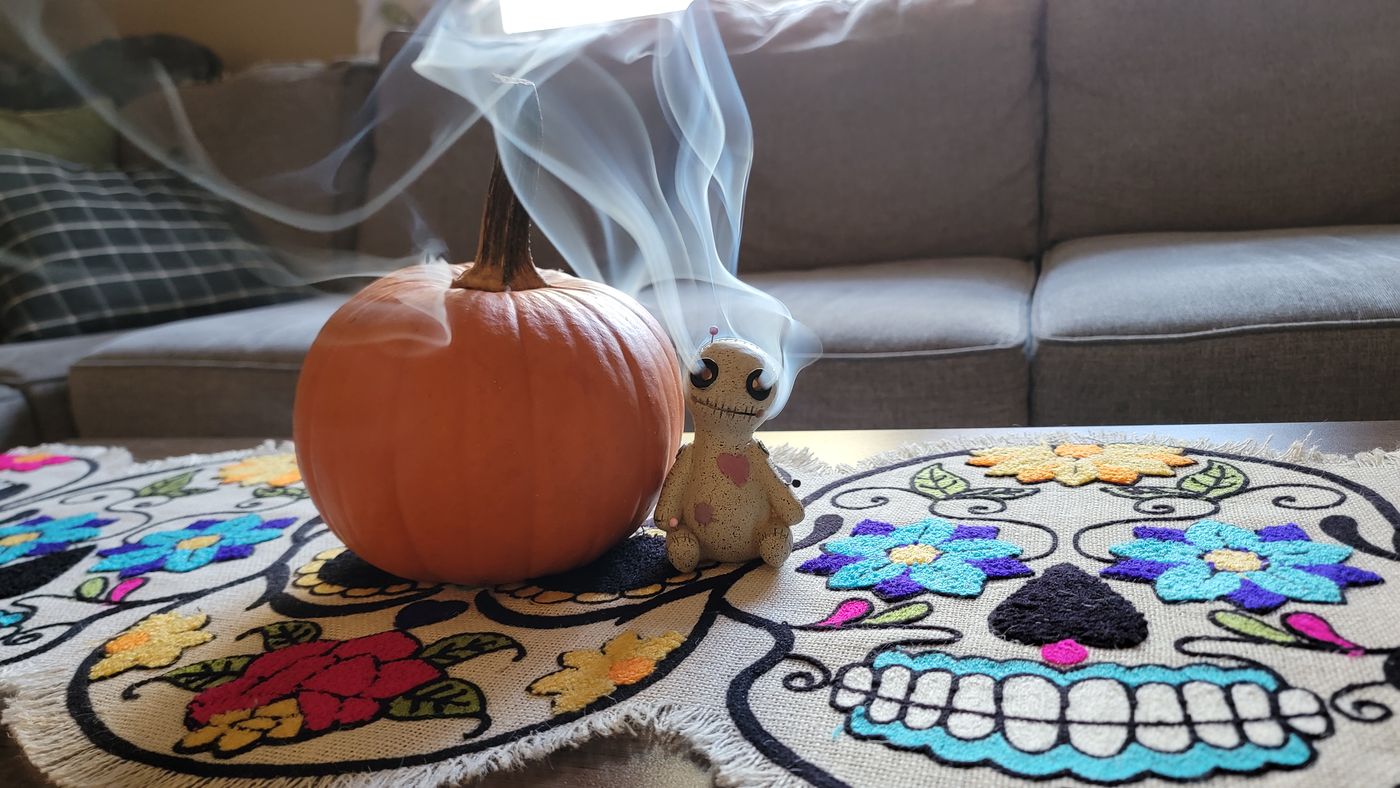 Pumpkin and incense smoke