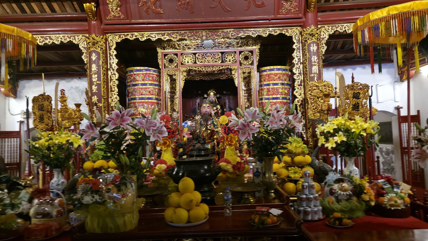 Temple altar with flowers and offerings