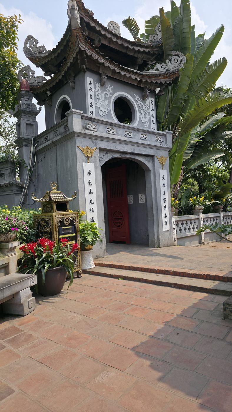 Temple gate with flower arrangements